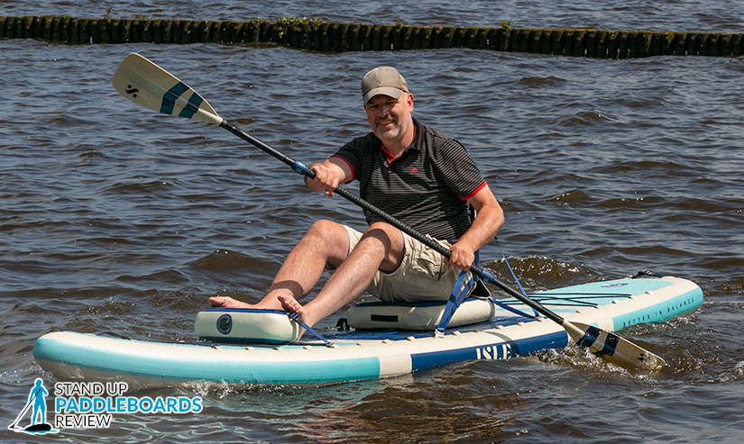 a paddle board kayak seat is an essential SUP accessory for paddle boarding on windy days