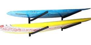 a paddle board wall rack is a must-have SUP board accessory for storing your solid stand up paddle boards
