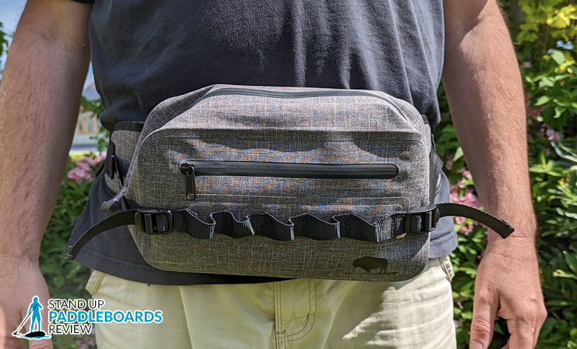 a waterproof waist pouch or fanny pack is another useful paddleboarding accessory for storing your keys phone snacks