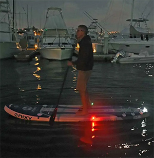paddle board lights are a fun paddle board accessory for stand up paddle boarding at night